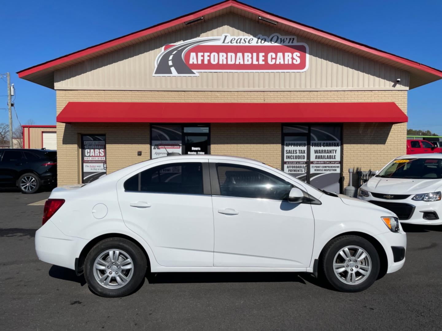 2016 White Chevrolet Sonic (1G1JC5SHXG4) with an 4-Cyl, 1.8 Liter engine, Automatic, 6-Spd transmission, located at 8008 Warden Rd, Sherwood, AR, 72120, (501) 801-6100, 34.830078, -92.186684 - Photo#0